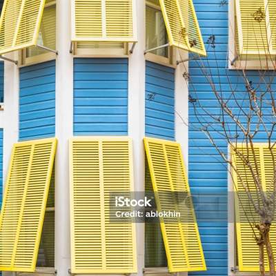 Hurricane Shutters On Windows: Colors and Styles to Match Any Home Design